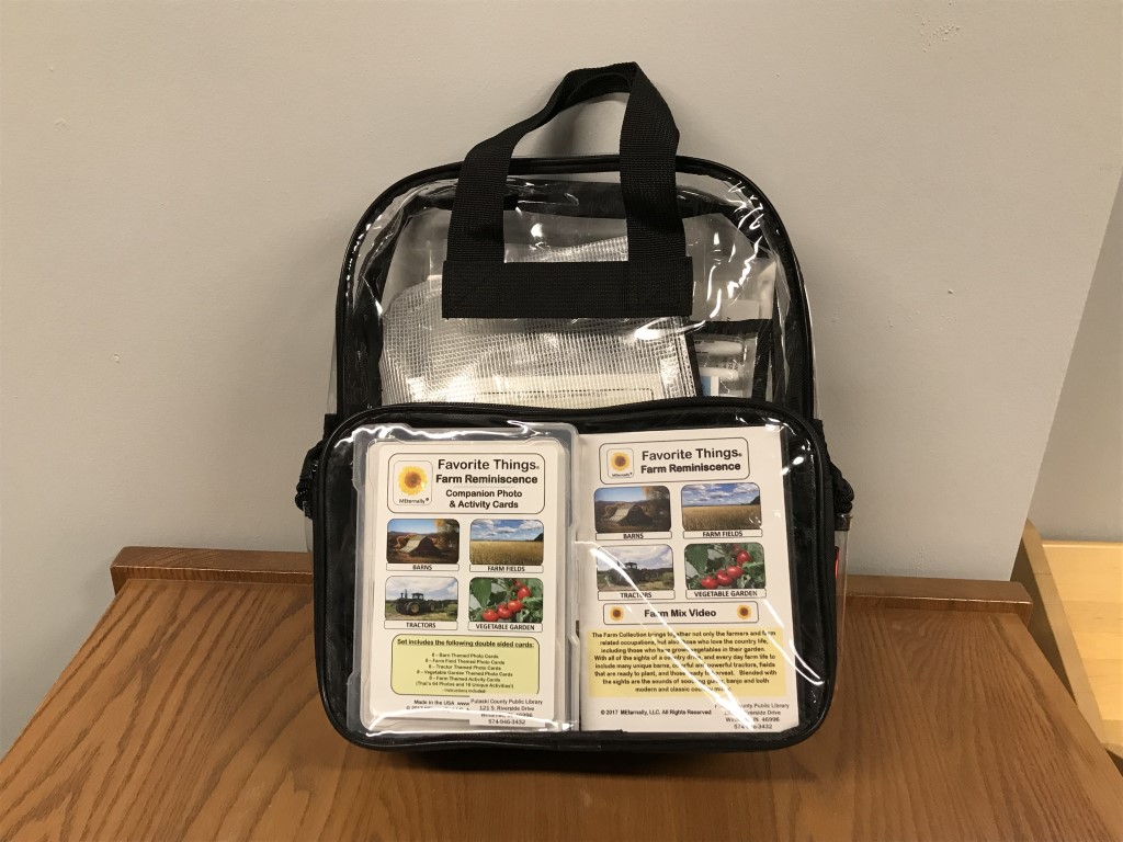 backpack filled with items for "Favorite Things: Farm Reminiscence"