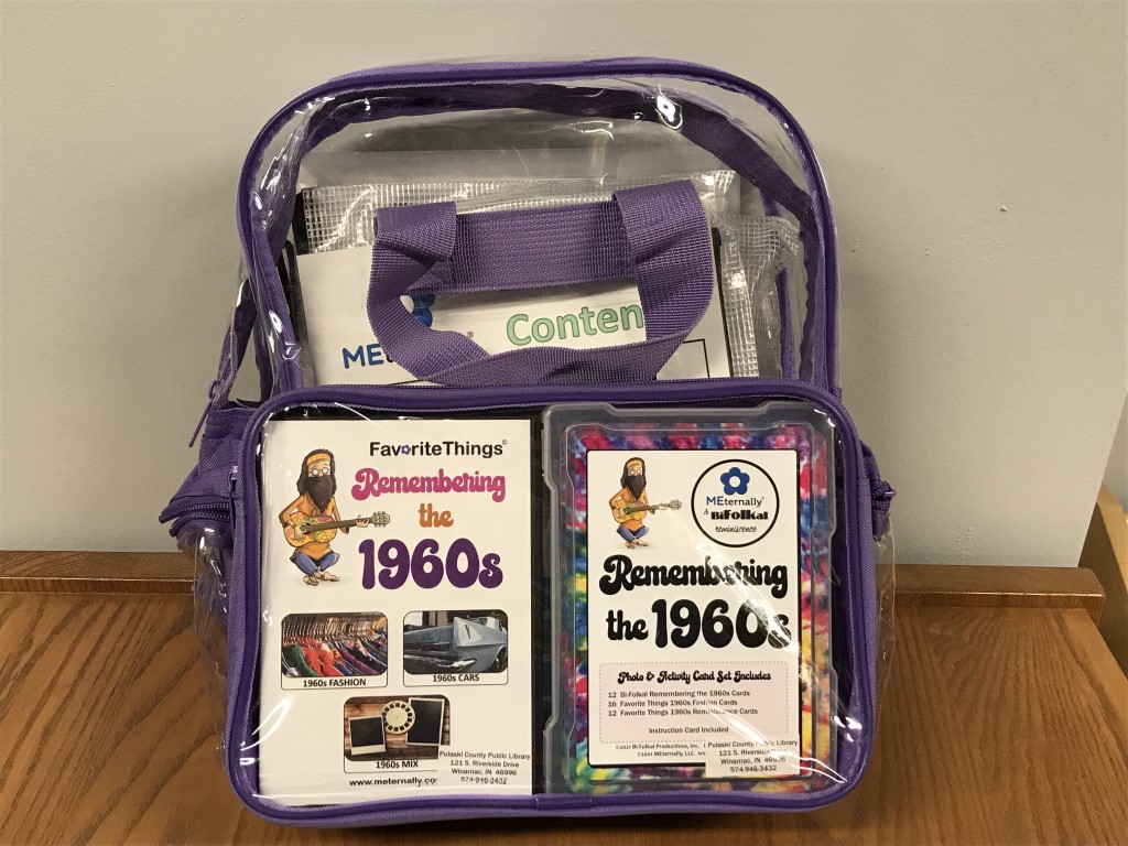 backpack filled with items for "Favorite Things: Remembering the 1960s"