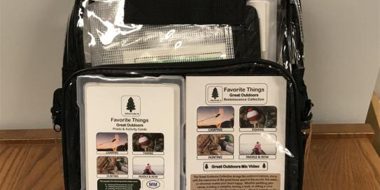 backpack filled with items for "Favorite Things: Great Outdoors Reminiscence"